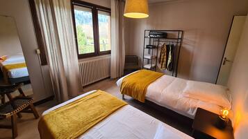 2 dormitorios, tabla de planchar con plancha, wifi y ropa de cama