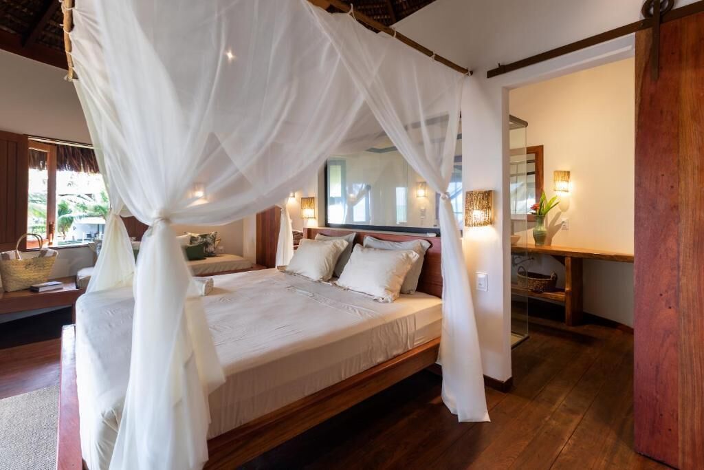 Quarto superior, 1 cama King, piscina particular, vista para a praia | Frigobar, cofres nos quartos, cortinas blackout