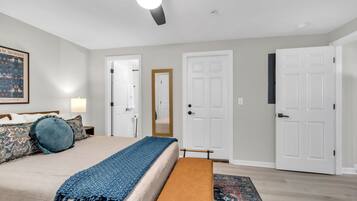 1 bedroom, desk, iron/ironing board, travel crib