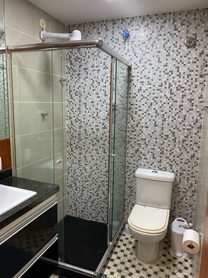 Shower, towels, soap, toilet paper