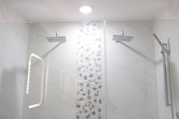 Shower, towels, soap, toilet paper
