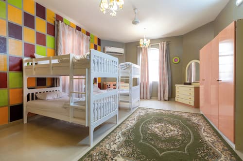 Family Villa, Garden View | 4 bedrooms, in-room safe, iron/ironing board, free cots/infant beds