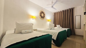 Comfort Quadruple Room, City View | Laptop workspace, blackout curtains, soundproofing, free WiFi