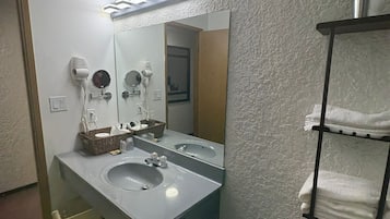 Hair dryer, towels, soap, shampoo