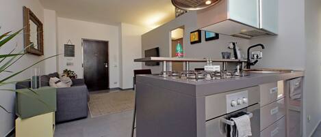 Fridge, microwave, stovetop, coffee/tea maker