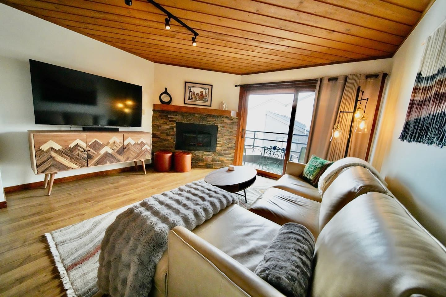 Enjoy the ambiance of the gas fireplace and stunning mountain views after your day of outdoor adventures. We provide an outdoor electric heater off the main balcony to keep you cozy at all times! 