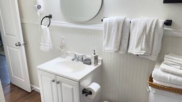 Hair dryer, towels, soap, toilet paper