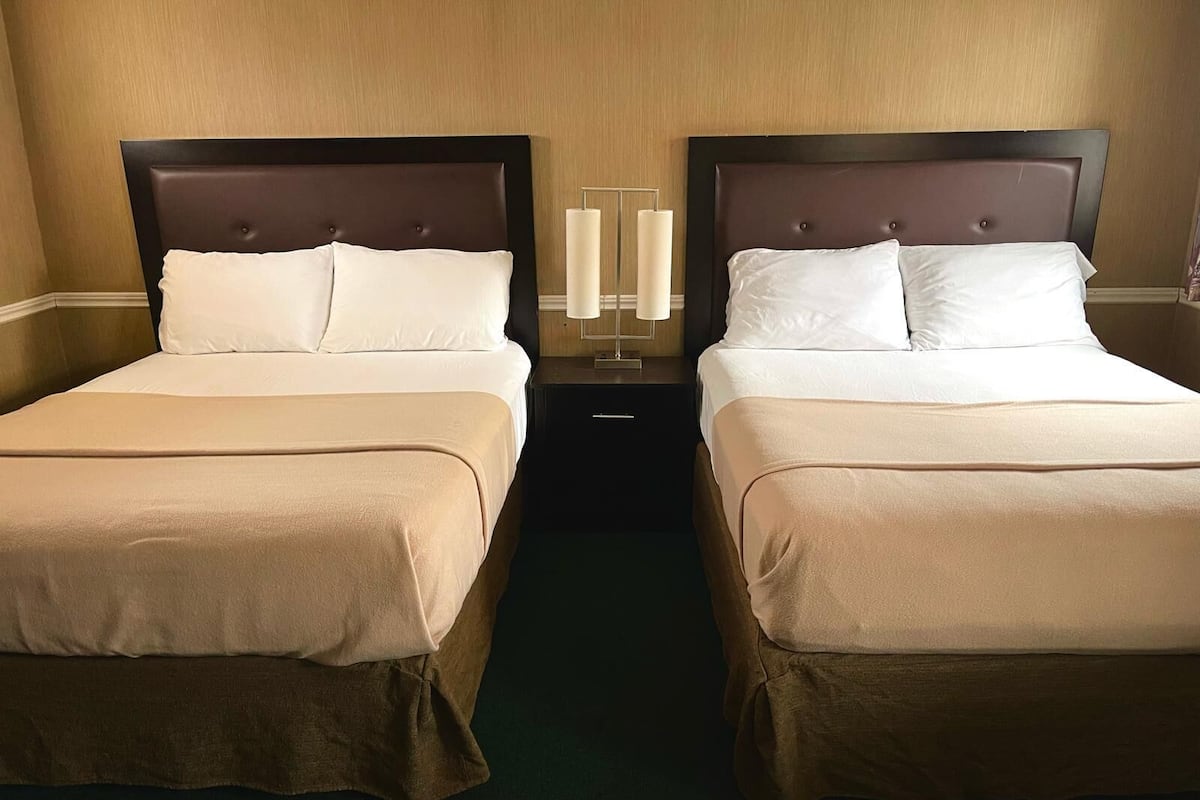 Deluxe kamer, 2 queensize bedden | Een laptopwerkplek, gratis wifi, beddengoed