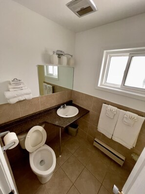 Deluxe Room, 2 Queen Beds | Bathroom | Towels, soap, shampoo, toilet paper - Adams Motel (Sault Ste. Marie)