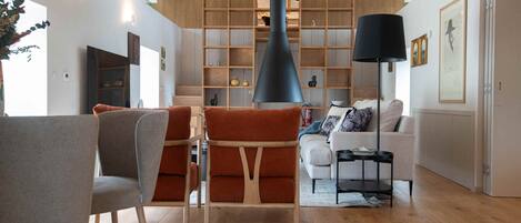 Deluxe Cottage | Living area | 55-inch flat-screen TV with cable channels, printers