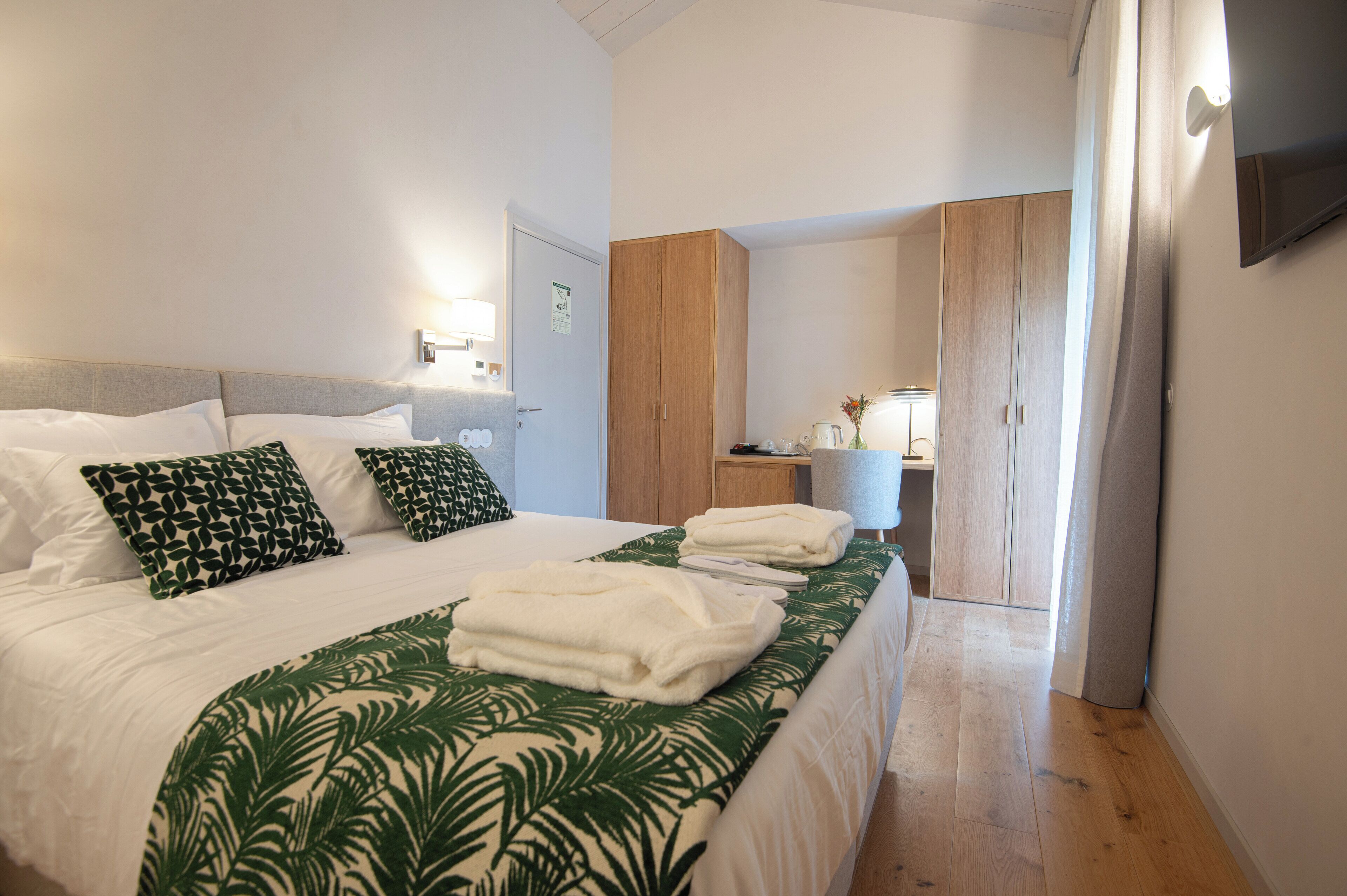 Premium bedding, memory-foam beds, minibar, in-room safe