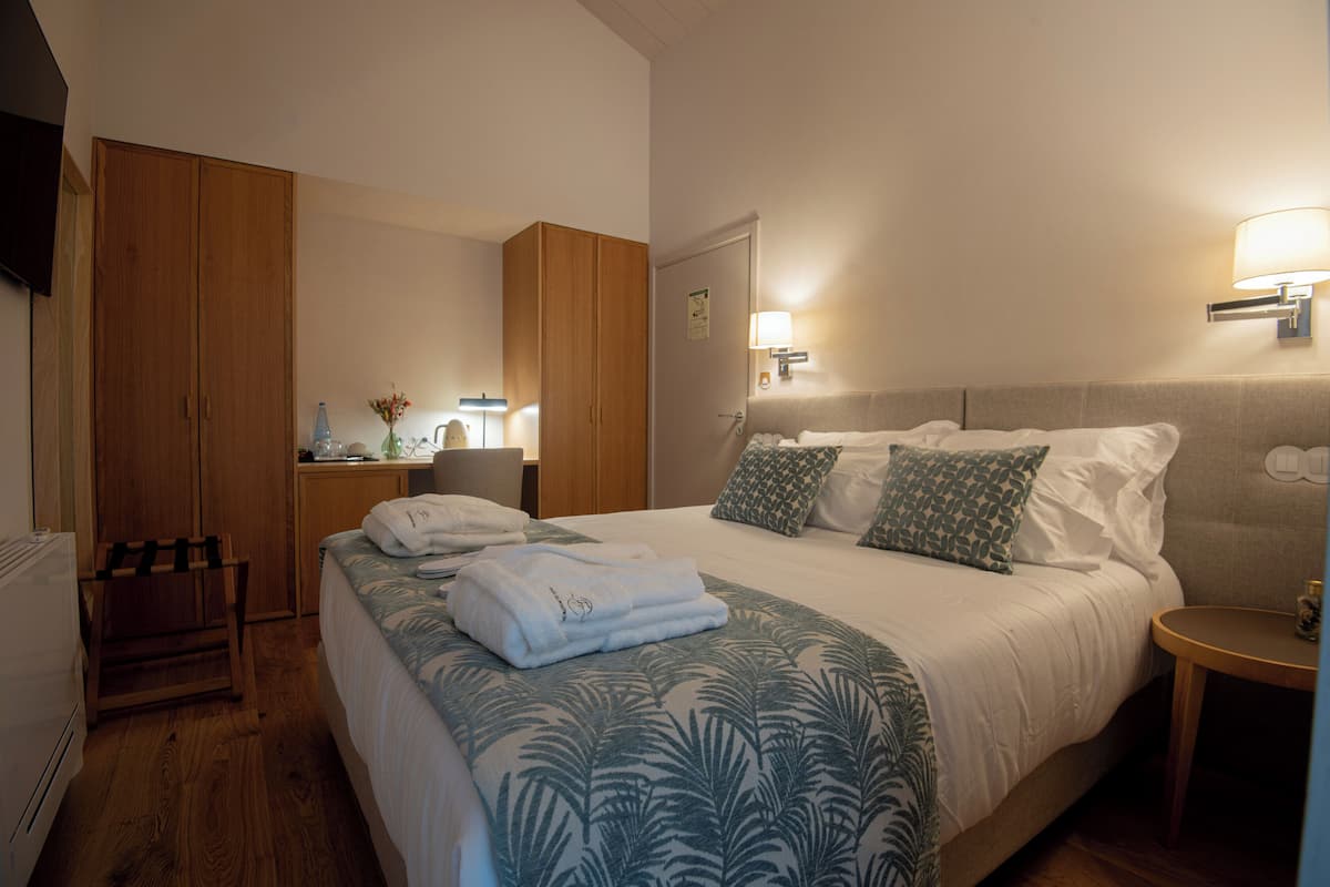 Premium bedding, memory foam beds, minibar, in-room safe