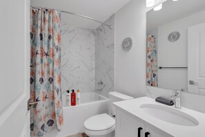 Hair dryer, towels, soap, toilet paper