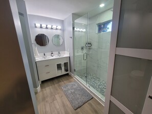 Shower, hair dryer, towels, soap