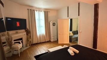 2 chambres, fer et planche à repasser, Wi-Fi, draps fournis