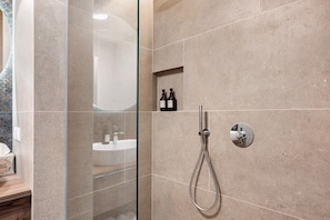 Shower, hair dryer, towels