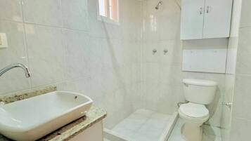 Shower, towels, soap, toilet paper