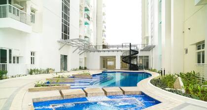 “JP Solana Staycation – Cozy Studio Near SM Manila with Pool & Gym Access!”