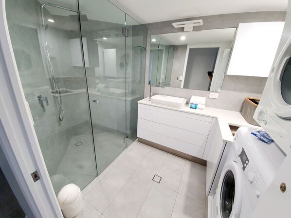 Shower, hair dryer, towels