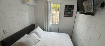 Charming 3-bedroom house with AC, WiFi. Near Surf City & La Libertad Beaches!