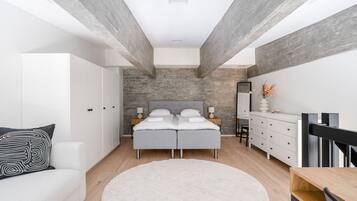 1 bedroom, desk, iron/ironing board, travel crib