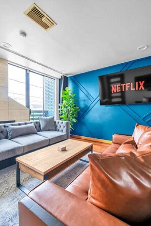 Living area - A. Houston Resort Style Pool - EV Charging (Houston)