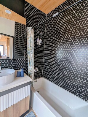 Hair dryer, towels, soap, shampoo