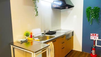 Fridge, microwave, cookware/dishes/utensils