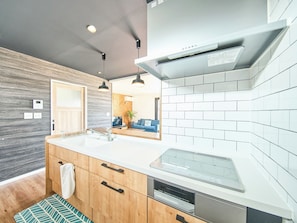 Fridge, microwave, stovetop, cookware/dishes/utensils