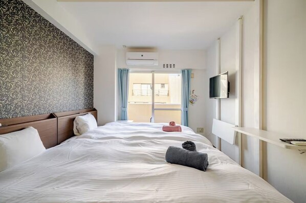 1 slaapkamer, een bureau, gratis wifi, beddengoed