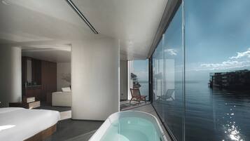 Quarto casal superluxo, vista para o oceano | Banheira de hidromassagem particular