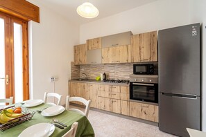 Family Apartment, Multiple Bedrooms (Casa Torre San Giovanni Near the Sea) | Private kitchen | Fridge, oven, stovetop, coffee/tea maker - Casa Torre San Giovanni Near the Sea (Ugento)