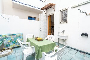 Family Apartment, Multiple Bedrooms (Casa Torre San Giovanni Near the Sea) | Outdoor dining - Casa Torre San Giovanni Near the Sea (Ugento)