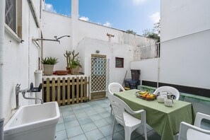 Family Apartment, Multiple Bedrooms (Casa Torre San Giovanni Near the Sea) | Outdoor dining - Casa Torre San Giovanni Near the Sea (Ugento)