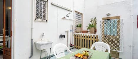 Family Apartment, Multiple Bedrooms (Casa Torre San Giovanni Near the Sea) | Outdoor dining