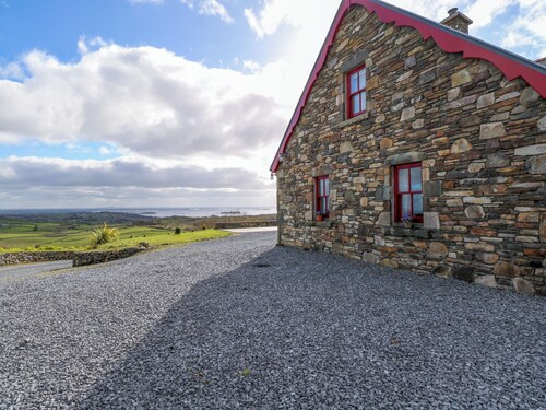 KATES COTTAGE, pet friendly, with open fire in Clonbur, County Galway
