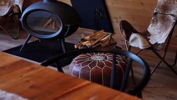 Fire Chalet | Living area | Flat-screen TV, fireplace