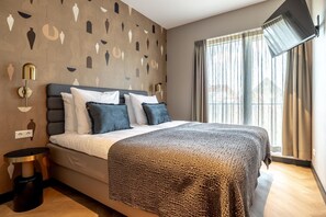 2 slaapkamers, een strijkplank/strijkijzer, internet