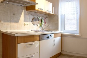 Comfort Apartment, 2 Bedrooms | Private kitchen | Fridge, microwave, oven, dishwasher