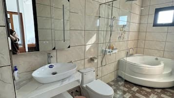 Shower, free toiletries, hair dryer, towels