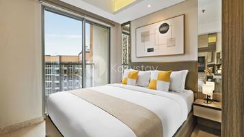 Apartment, 1 King Bed, City View | 1 bedroom, iron/ironing board, free WiFi