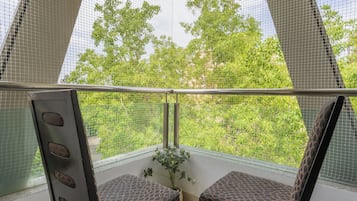 Chambre Double Deluxe, balcon, vue parc | Coin séjour