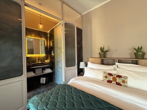 Habitació doble Deluxe | Roba de llit d'alta qualitat i cobrellits 