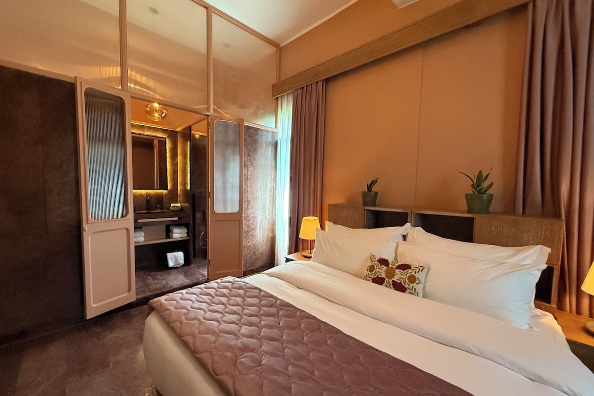 Premium bedding, down duvets, memory-foam beds, in-room safe