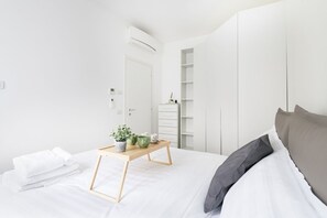 1 غرفة نوم ومكواة/لوح كي وواي فاي وملاءات أسرّة