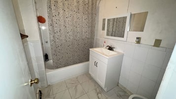 Combined shower/tub, soap, toilet paper