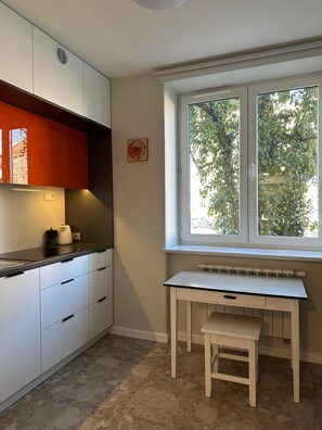 Apartment, Garden View | Private kitchen | Coffee/tea maker, freezer
