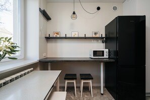 Apartment, Garden View | Private kitchenette | Coffee/tea maker, electric kettle, freezer - Native Apartments Fałata 12 (Kraków)