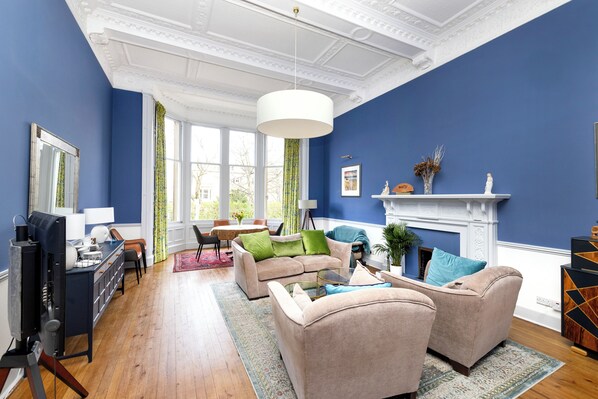 Apartment, City View | Living area | 24-inch Smart TV with cable channels, fireplace