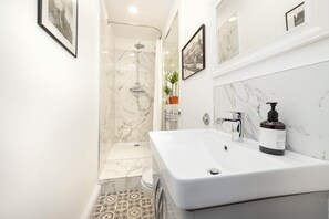 Departamento, vista a la ciudad | Baño | Secadora de cabello 